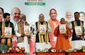 UP BJP Manifesto 2022 Promises Free Cylinder, Electricity, Scooty & 2 Crore Tablets to Youth, Women, & Farmers